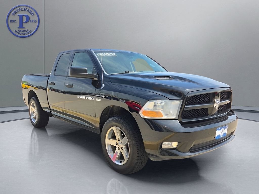 2012 RAM 1500 Express in Black — front three-quarter view