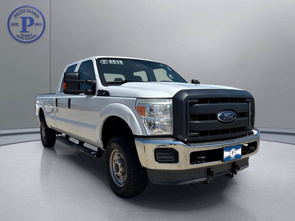 2016 Ford Super Duty F-250 SRW Lariat in White — front three-quarter view
