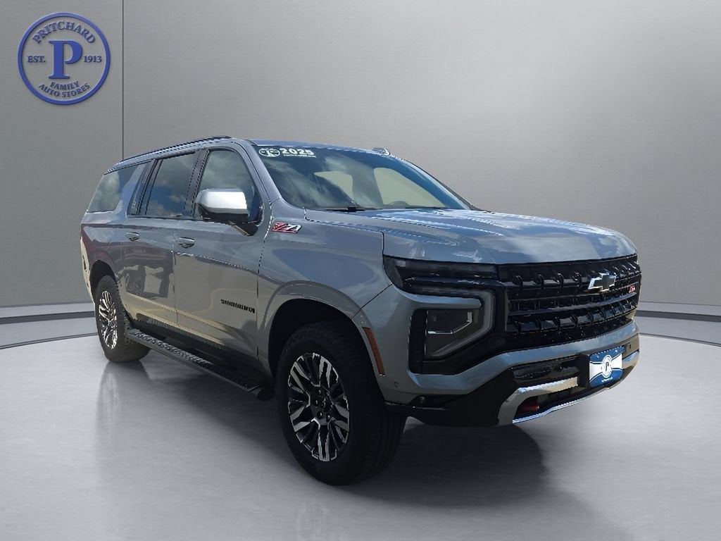 2025 Chevrolet Suburban Z71 in Sterling Gray Metallic — front three-quarter view