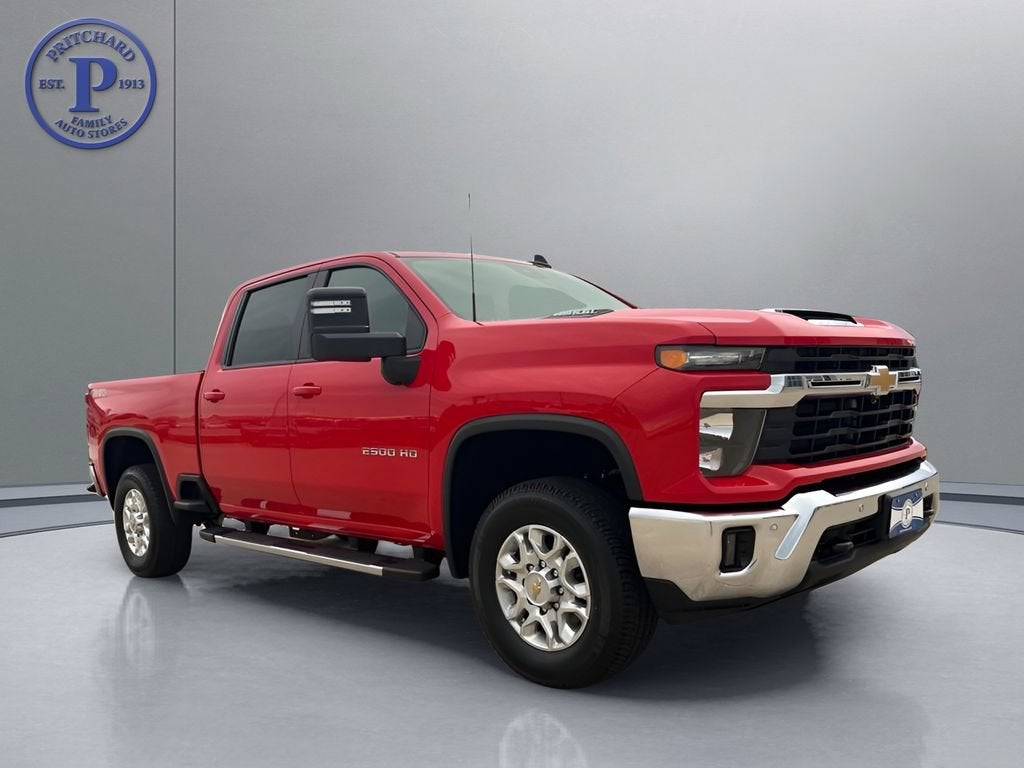 2026 Chevrolet Silverado 2500 HD LT in Red Hot — front three-quarter view
