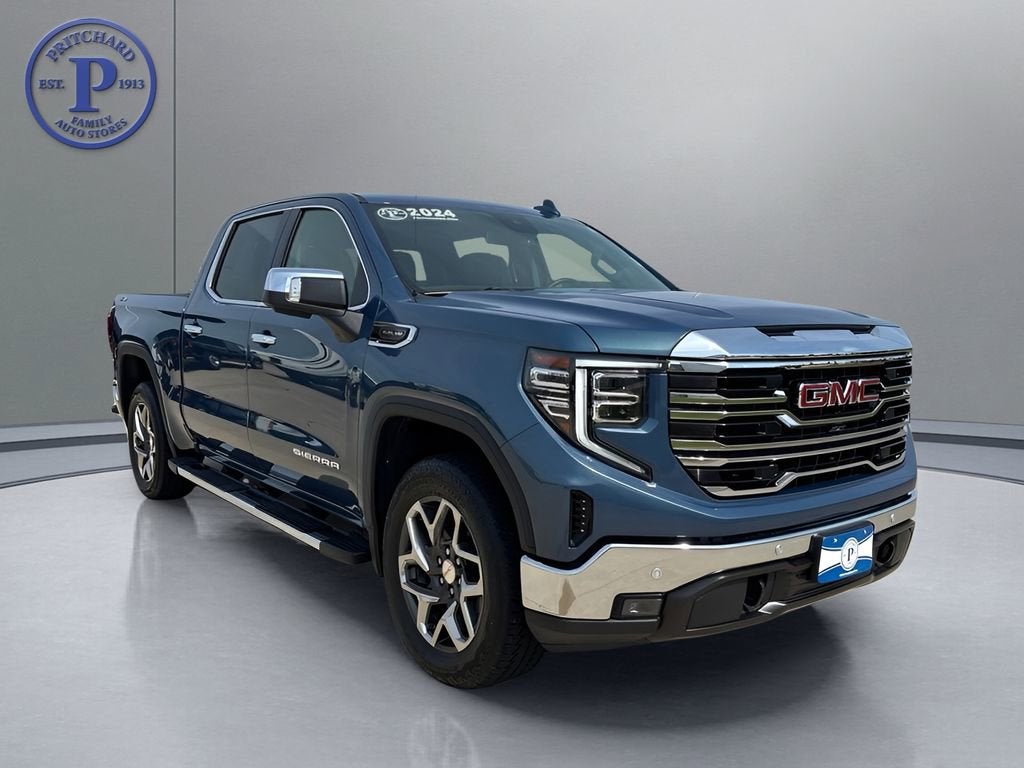 2024 GMC Sierra 1500 SLT in Downpour Metallic — front three-quarter view