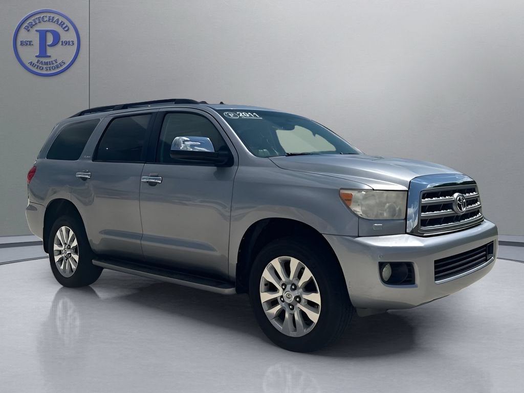 2011 Toyota Sequoia Platinum in White — front three-quarter view